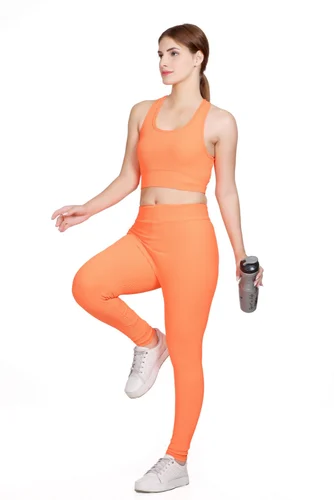 Custom orange fitness activewear set by Velnox Wear