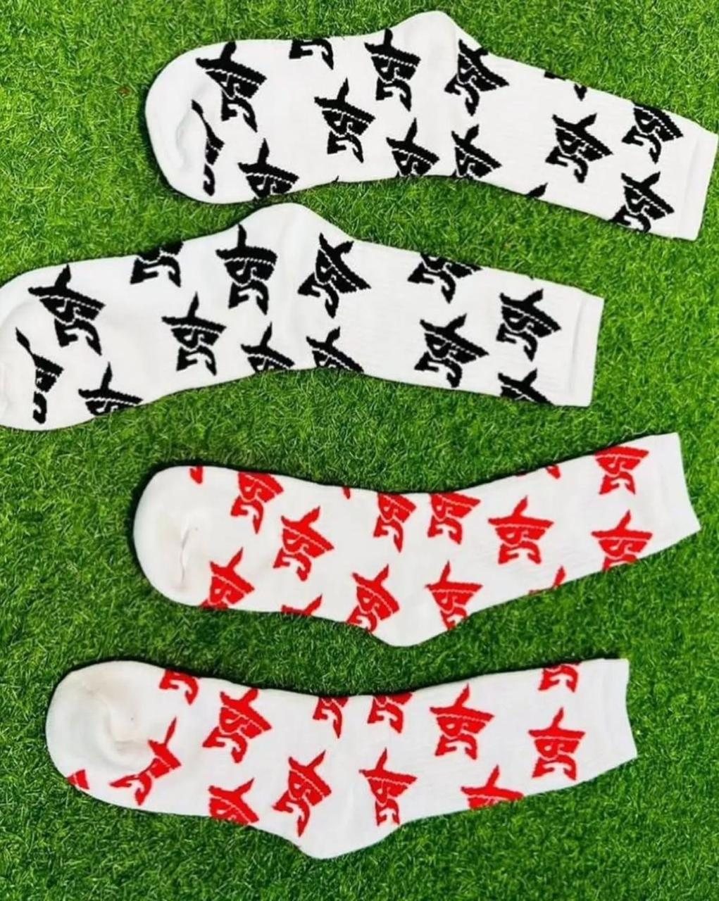 Custom white athletic crew socks with black and red logo patterns