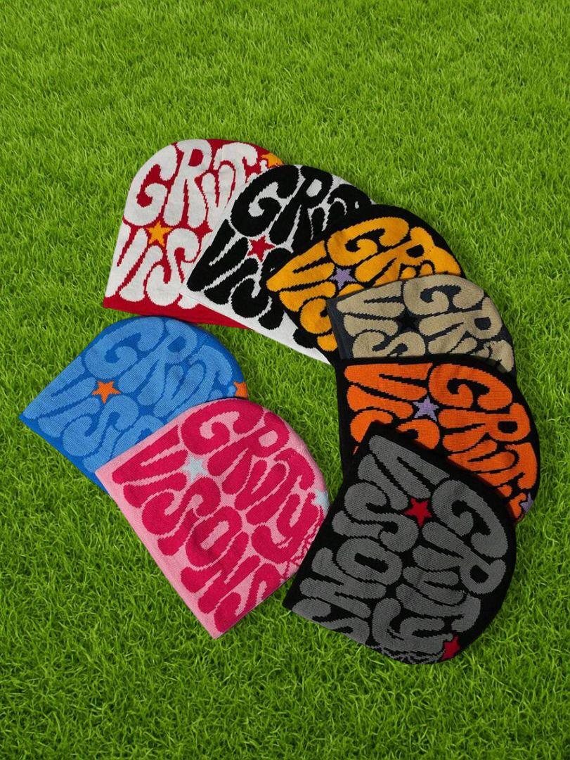 Custom jacquard knit beanies in eight streetwear colorways on turf