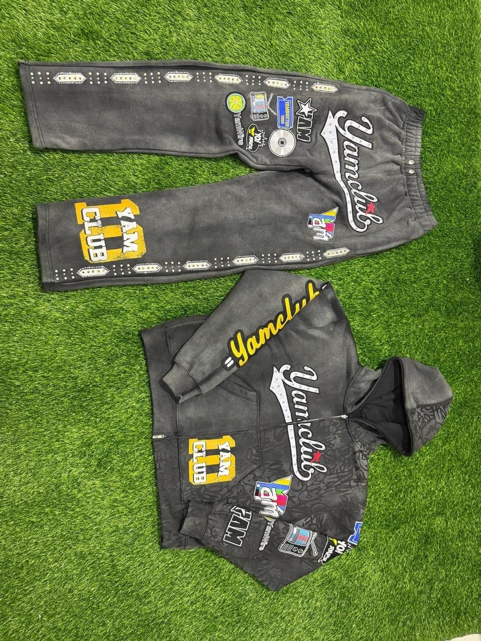 Custom graphic zip hoodie and sweatpants with patches across colorways detail 4