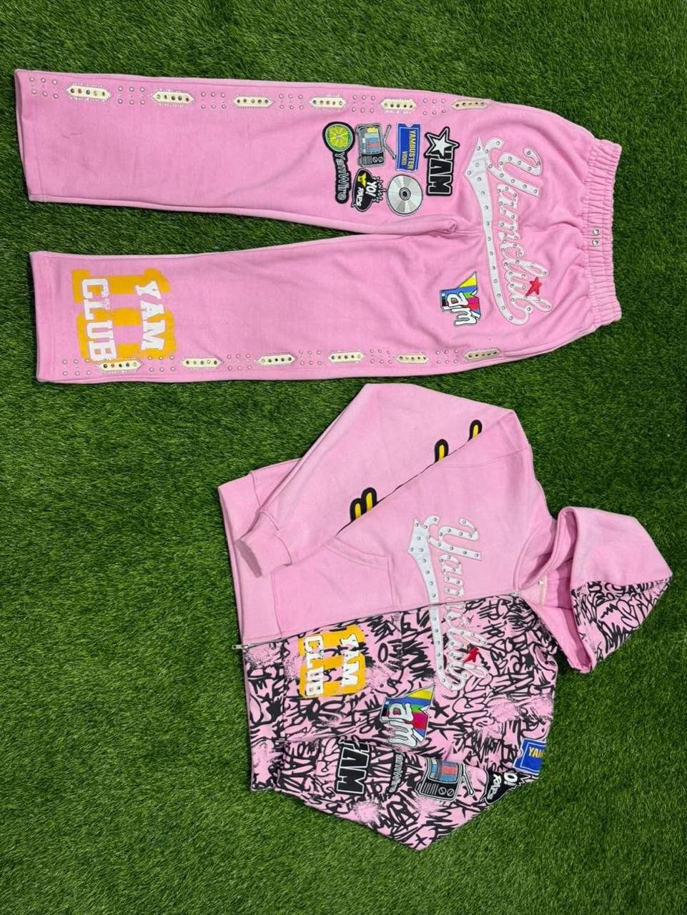 Custom graphic zip hoodie and sweatpants with patches across colorways